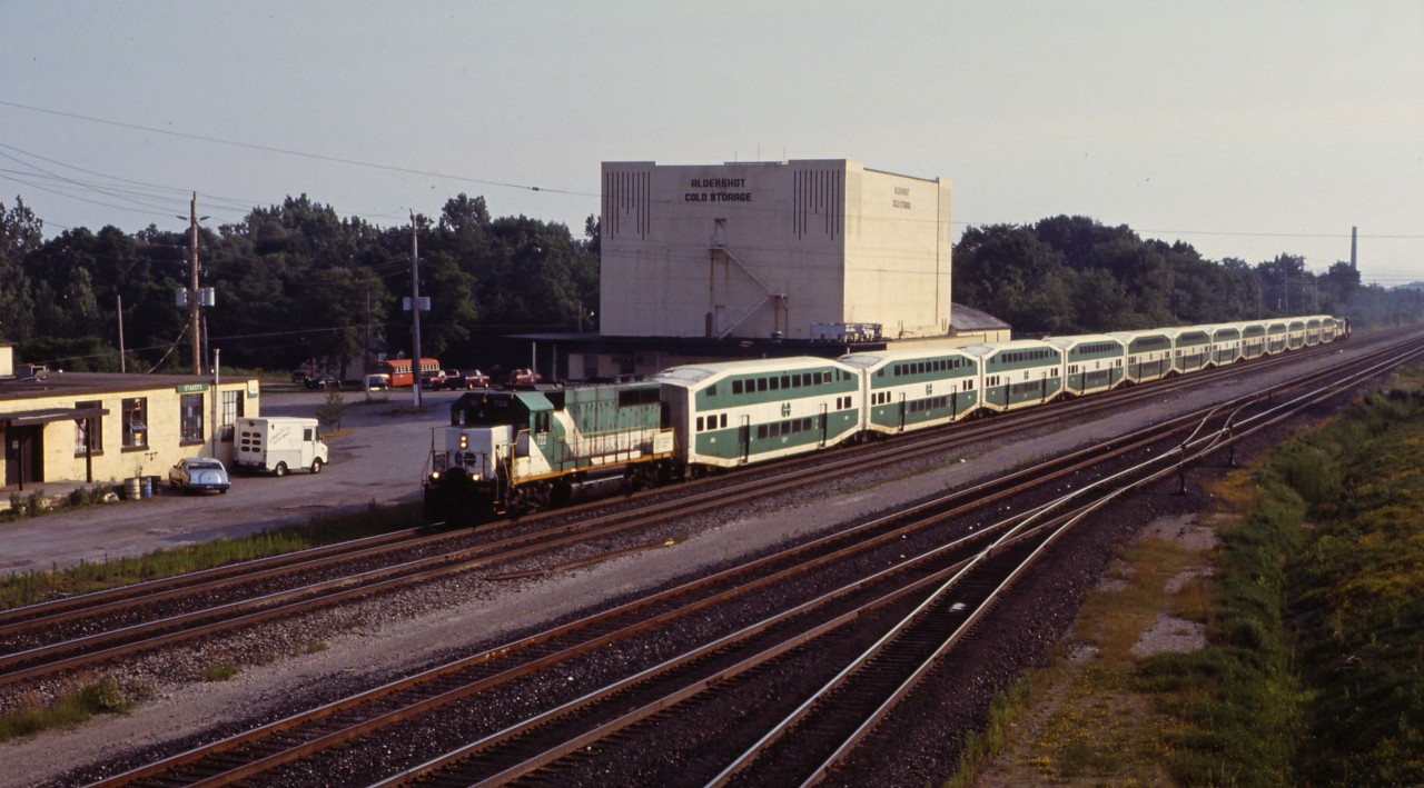 Our summer's evening wouldn't be complete without seeing a GO train...in this case, one of two deadheading back to Willowbrook (Mimico) from Hamilton. Before the F59PHs took over all GO trains, a number of trains in the early 1990s still operated with GP40-2LWs or ex-Rock Island GP40s and power cars, such as this 12-car consist with an ex-Rock Island unit on each end and also an ex-Ontario Northland FP7 power car.