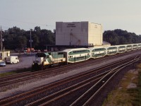 Our summer's evening wouldn't be complete without seeing a GO train...in this case, one of two deadheading back to Willowbrook (Mimico) from Hamilton. Before the F59PHs took over all GO trains, a number of trains in the early 1990s still operated with GP40-2LWs or ex-Rock Island GP40s and power cars, such as this 12-car consist with an ex-Rock Island unit on each end and also an ex-Ontario Northland FP7 power car.