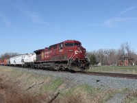 This 92 car eastbound would sit in the Lobo siding for CP 141 and CP 235. Taken at Jury Road.