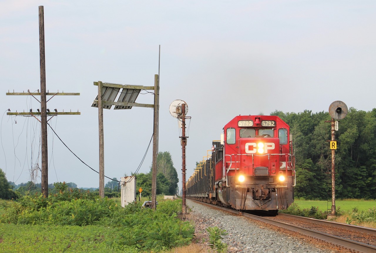This is the third and final shot we got of the CWR train back in early July. After the rail train met 141 in Bothwell, we went east and discovered these classic bi-directional searchlights on accident near a crossing. Apart from the solar panel, this scene has been largely untouched and it was a treat to see a classic SD40 leading past them. As far as I know, these are one of the last sets left like this on CP in Southwestern Ontario.