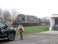 Sometimes its the little details I miss the most. I have to admit, even though Cando's paint scheme is not very colourful it still looks very sharp. I never gave it much thought most of the time when the Cando truck would arrive, often up to a half hour before the train at Streetsville. Its purpose was simple, help out the train crew and speed up the switching process, throw switches, and open and close derails as needed. This practise has come and gone with Trilliums take over, and I have to admit I miss it, especially the early warning that the train is coming. May 4, 2018 was just another day for the OBRY crew. The weather was lousy, but the fog always brings me out, just incase there is a unique photo to be made. Unfortunately the fog began to burn off a bit earlier then I wanted, but I couldn't resist capturing a very short northbound train passing the Cando truck after completing switching in town. The crew member heading to the truck is calling out the all clear to depart town, and sadly Cando would have less then two months remaining on this day before handing over the operations to Trillium. 