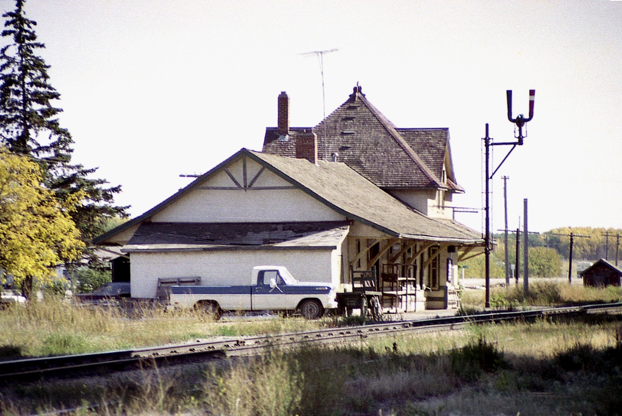 The station dates from roughly 1905. From looks the community was well served at one time,rather nice building for a town of less than 1000 citizens. Last passenger service ended in 1977 and no doubt the building came down not long after that. Most small town prairie stations were built with agent's living quarters upstairs, as in this case.
