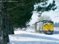Before 6508 was repainted from its CN inspired green and gold, a plow extra is reversing at Gladstone to take a second pass. I'll never get tired of this.