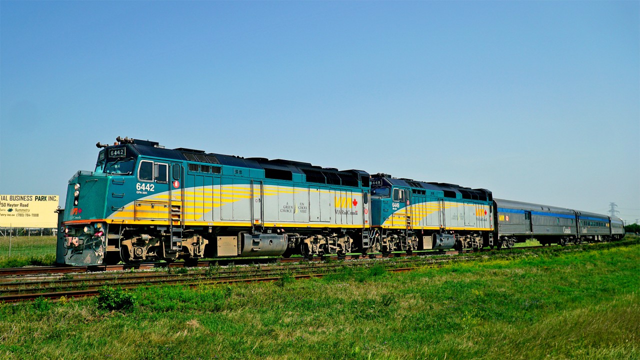 Only about 4 hours late today VIA #1 drifts through Clover Bar behind F40PH-3 6442 and 6449