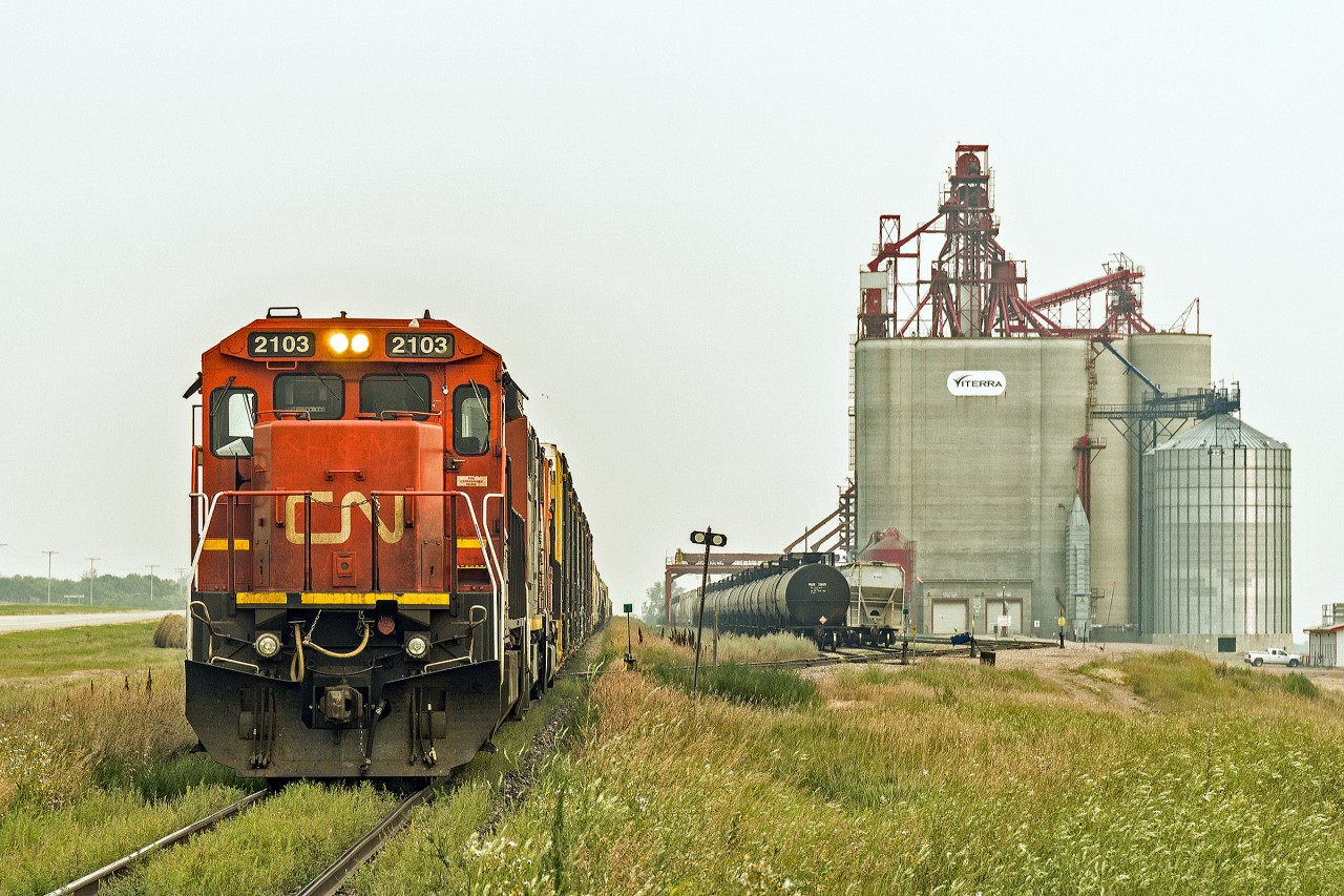 Eastbound, sitting just outside North Battleford on the Aberdeen sub is Dash 8-40C CN 2103 (ex UP)  There was no sign of a crew and the loco seemed to be auto-idling. One thing for sure nothing else is travelling this route until they get it on its way, or at least move it up into the yard.