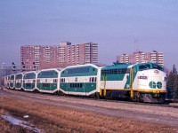 GO 904 is on one end of this GO train in Scarborough, Ontario on March 24, 1982.