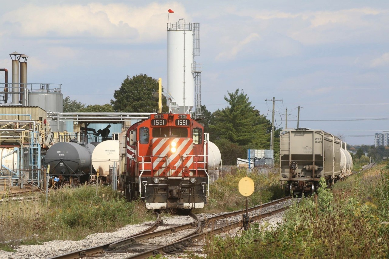 I have never gotten a chance to photograph OSR switching this far west on the Southern Guelph North spur, but after talking to the crew it appears they switch here quite often. AOC Canada specializes in resins and take in quite a few tank cars a week. OSR GP9U 1591 and RS23 504 have a few switching moves to perform before pushing their train back to the interchange between OSR and GEXR where the line meets the Fergus spur.