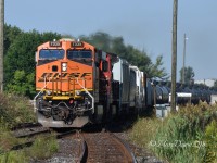 It's not unusual to see something foreign on train 504 but I was surprised when it was an actual BNSF unit and not a leaser. BNSF 7335 with CN 2108 roll by Hobson inbound for Sarnia. 