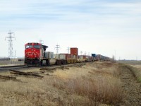 CN 2201 brings up the markers on train Q101, heading west for Dacotah and points beyond on the Rivers Sub