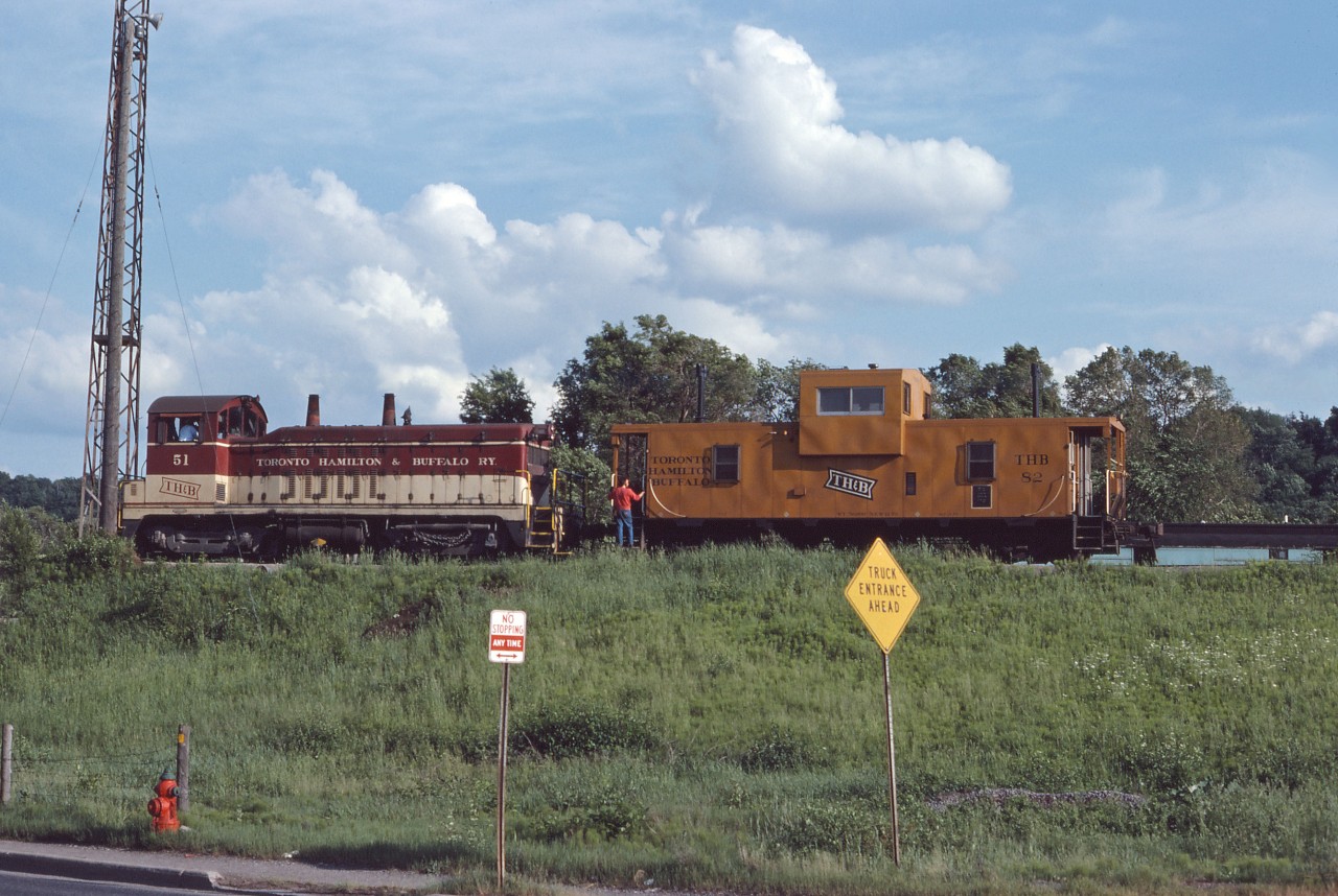 NW-2 #51, the TH&B's first diesel-electric locomotive (built in December 1947), is seen handling Van #82 at Aberdeen Yard on June 1, 1975. The 51 is now owned by the Ontario Southland Railway.