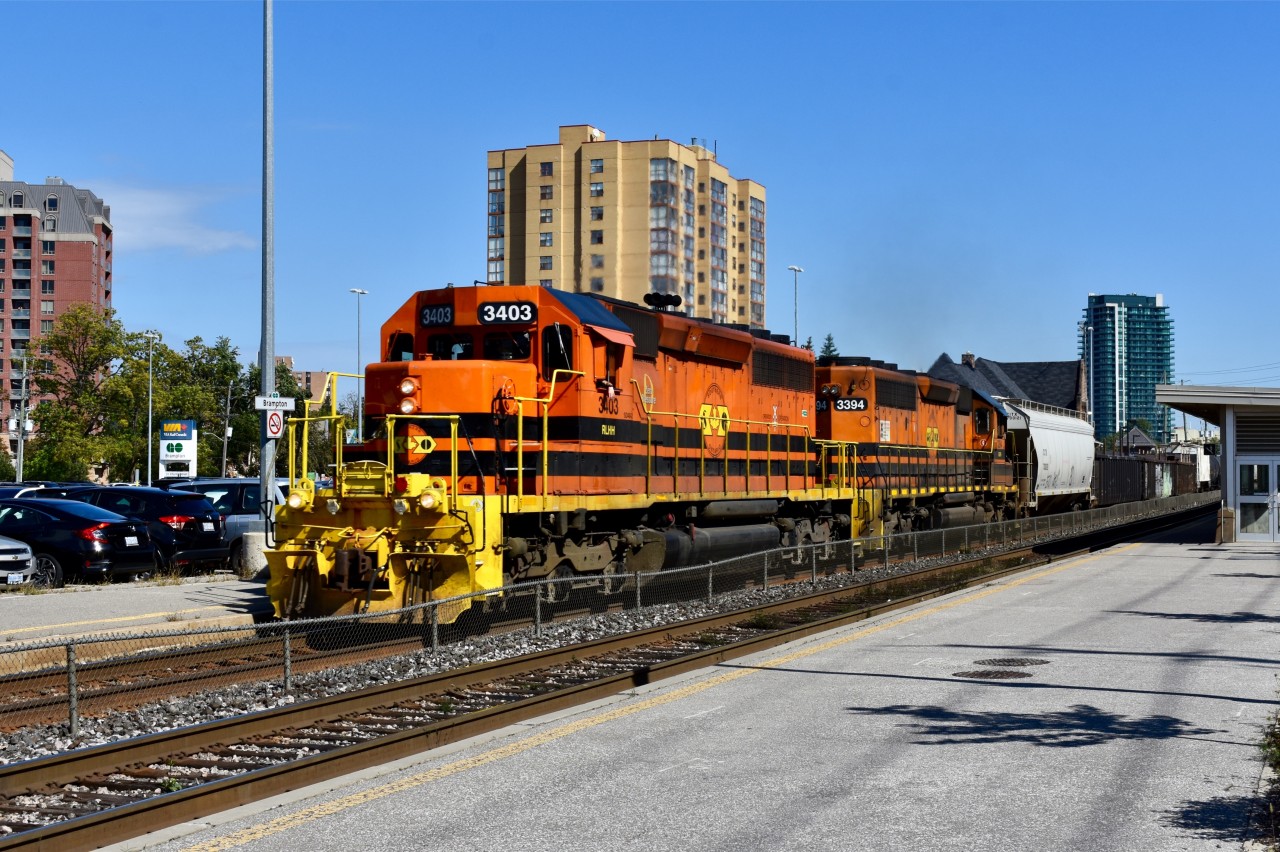 Zipping through the Downtown Brampton GO/VIA station, GEXR throttles up and heads home to Stratford after making its usual morning run down the Halton to interchange with CN.  Time: 13:40