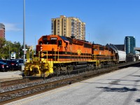 Zipping through the Downtown Brampton GO/VIA station, GEXR throttles up and heads home to Stratford after making its usual morning run down the Halton to interchange with CN. <br> Time: 13:40