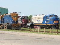 11 years before being repainted into Ontario Southland Railway colors, RaiLink FP9u 1401 sits at the Goderich-Exeter Railway shop in Goderich, Ontario with stored CEFX GP38-3 6537 and GEXR GP38 3856, which was undergoing routine maintenance. 