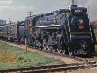 CN 6218 fan trip has arrived in Dunnville and is about to cross the TH&B Port Maitland Sub.  