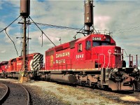 CP 5648 at the old Agincourt sand towers shows it's unique spray painted nose initials with STL&H markings still visible underneath. This unit was used to build SD30ECO 5039. 