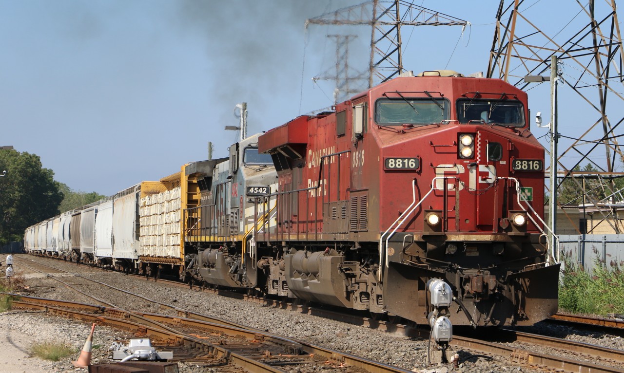 CP 8816 lead's CP 140 east at Dougall Ave in Windsor, Ontario before backing into Windsor Yard.