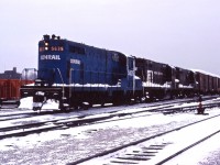 Three Conrail GP7s lead a transfer into Fort Erie on a snowy day in late December 1977.