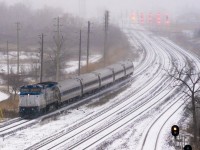 It was a blistery cold and snowy Saturday morning at Oakville GO Station. The parking structure provided little protection, although it kept the falling snow off my camera. Already having made several trips to Montreal on The Adirondack, this would be Amtrak Dash 8 514's only visit to Toronto on the Maple Leaf.