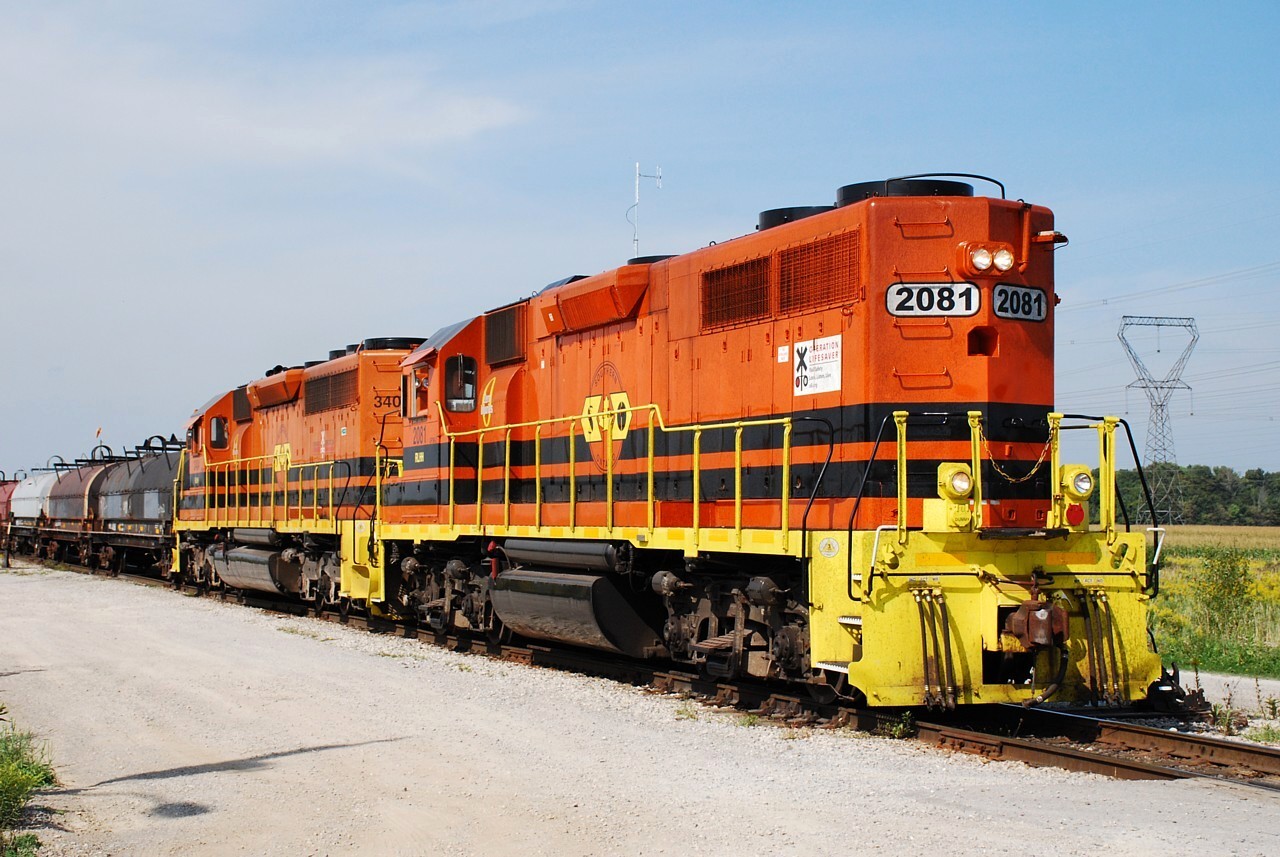 Southern-style on the Southern Ontario Railway.  QGRY 2301, which was on the east end of the locomotive consist apparently died on 597 last and was set off for repairs, resulting in the unusual appearance of long hood forward RLHH 2081 on 595 this afternoon.  Too bad it wasn't RLHH 2111, their former Southern GP38 that was originally built to operate long hood forward.