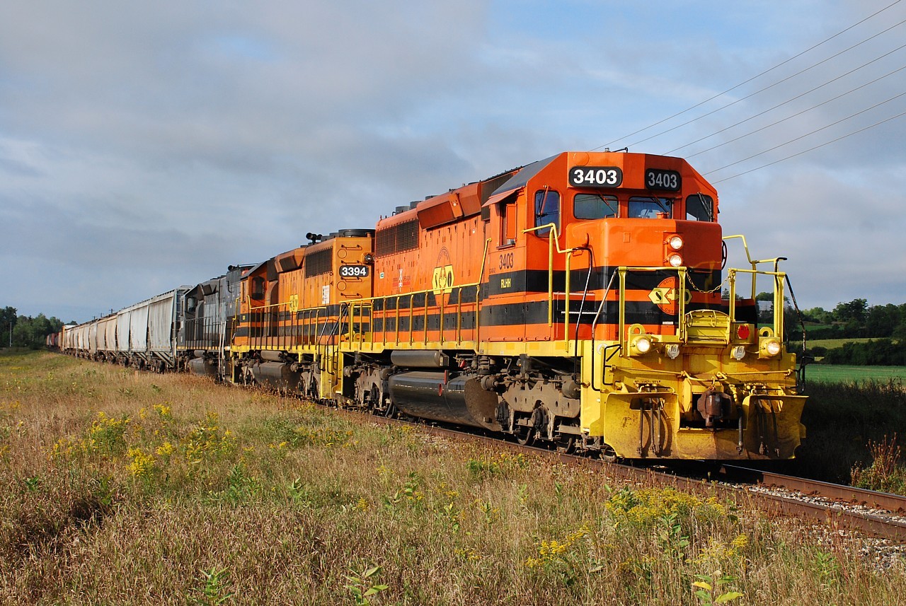 In nice morning light, GEXR train 432 accelerates out of Guelph with Southern Ontario Railway 3403 leading.