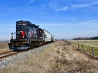 Rolling through the farmlands of Caledon, CCGX 4015 is seen approaching Old School Road on a decent spring morning with 3 freight cars trailing that will be set off for CP in Mississauga an hour or so later in the morning. <br> Time: 09:19