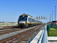 UP Express Train 1012 zippes over Carlingview dr on its way back to Pearson Airport after dropping off a handful of passengers traveling from Pearson to Union and picking up another handful of passengers who are making their way from Union to the airport. <br> Time: 14:59 