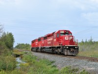 Having been parked at Guelph Junction all weekend as the power for the ribbon rail train, CP 6259 hauls a broken down CP 5866 westward light power, towards London where repairs will be done. 