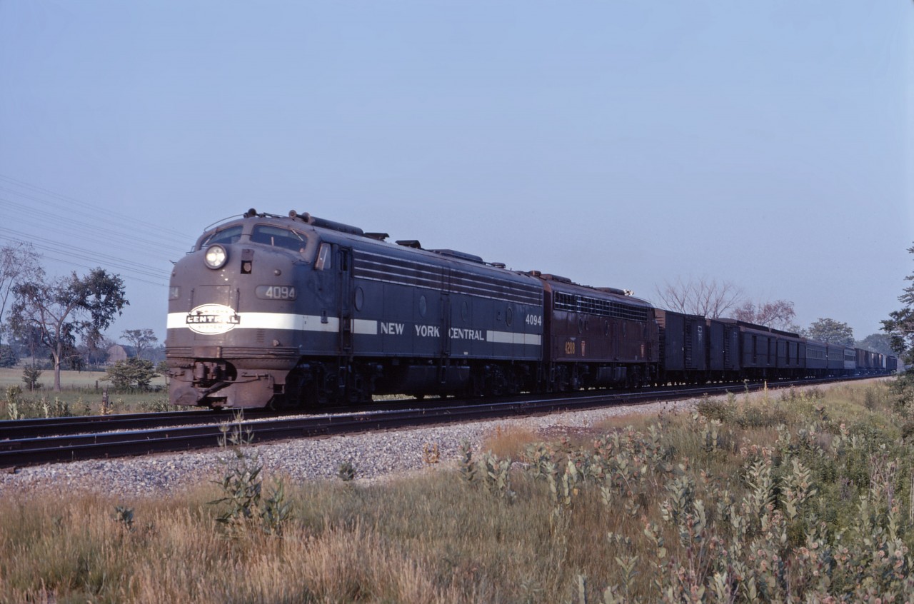 While some trains in 1968 did not show any signs of the PC merger, others were mixing equipment from both roads. In this case, we have NYC E8A 4094 leading PRR sister 4288 on a smallish mail and express train.