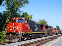 CN-2682 EF-644-F with CN-2007 EF-640-h plus 2 others locos   pulling a long convoy goin in Montréal Taschereau yard 