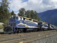 The westbound Rocky Mountaineer cruises through Revelstoke behind GP40-2(W) RMRX 8014 and GP40-2 RMRX 8019