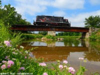 <b>Last Cando train on the OBRY:</b> I was away the week before and knew I had no chance in hell at getting the last OBRY run on the Friday. But when I got home I learned the train was delayed a day... and of course I booked it Saturday to Streetsville to get a couple photos of the last train. I had had an interest in this bridge for some time but never scoped it out - and thankfully I had the time to compose something that turned out rather nice - luck was also on my side as the sun came out at the last minute just as Steve Bradley and Steve Thomas, crew for the train, crossed over the Credit River and into my frame.<br><br>I would also learn that the former Toronto Suburban Railway (to Guelph, abandoned 1930's) right of way and diamond with the CPR (CVR) Branches was just to the left by Derry rd. The TSR ROW basically was within feet of the river on other side of the railway bridge on the left (west) side. There isn't much evidence left of the TSR But some does exist at this spot, it's one of the few undeveloped portions of land in the sprawling Mississauga area.<br><br>Cheers to the Cando boys and thanks for the great memories.