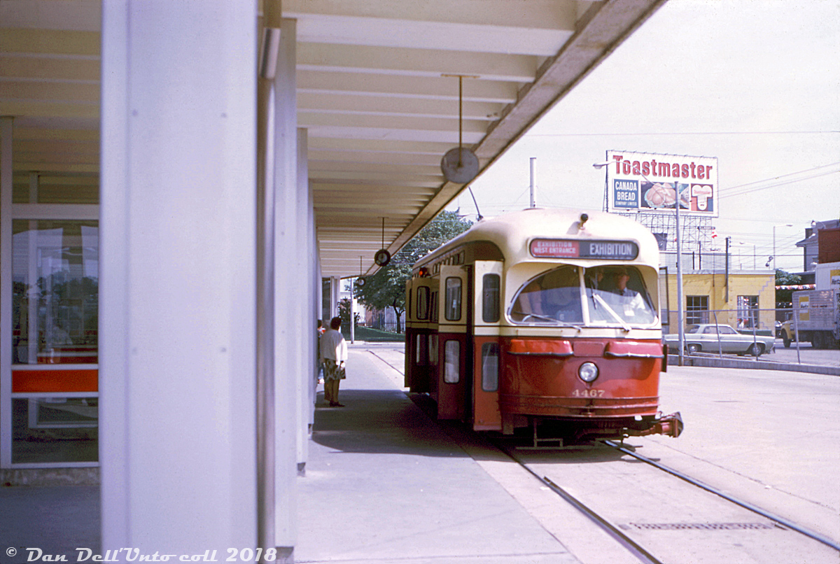 TTC PCC 4467 takes on a load of passengers on a sunny afternoon at Dundas West Subway Station, before departing bound for the annual Canadian National Exhibition held at the end of each summer. Special shuttle buses and streetcars were run by the TTC to shuttle crowds to and from the CNE from various points in the city. The routing of this run was likely Dundas West station, down Dundas St., down Dufferin St. and ending at Dufferin Loop, located by the CN Oakville Sub just outside the west entrance of the CNE.

In the background, the yellow building was occupied by Hertz rent-a-car, and behind that on the other side of Dundas Street was the large Canada Bread factory (Toastmaster sign on the roof).

Lewis Swanson photo, Dan Dell'Unto collection.