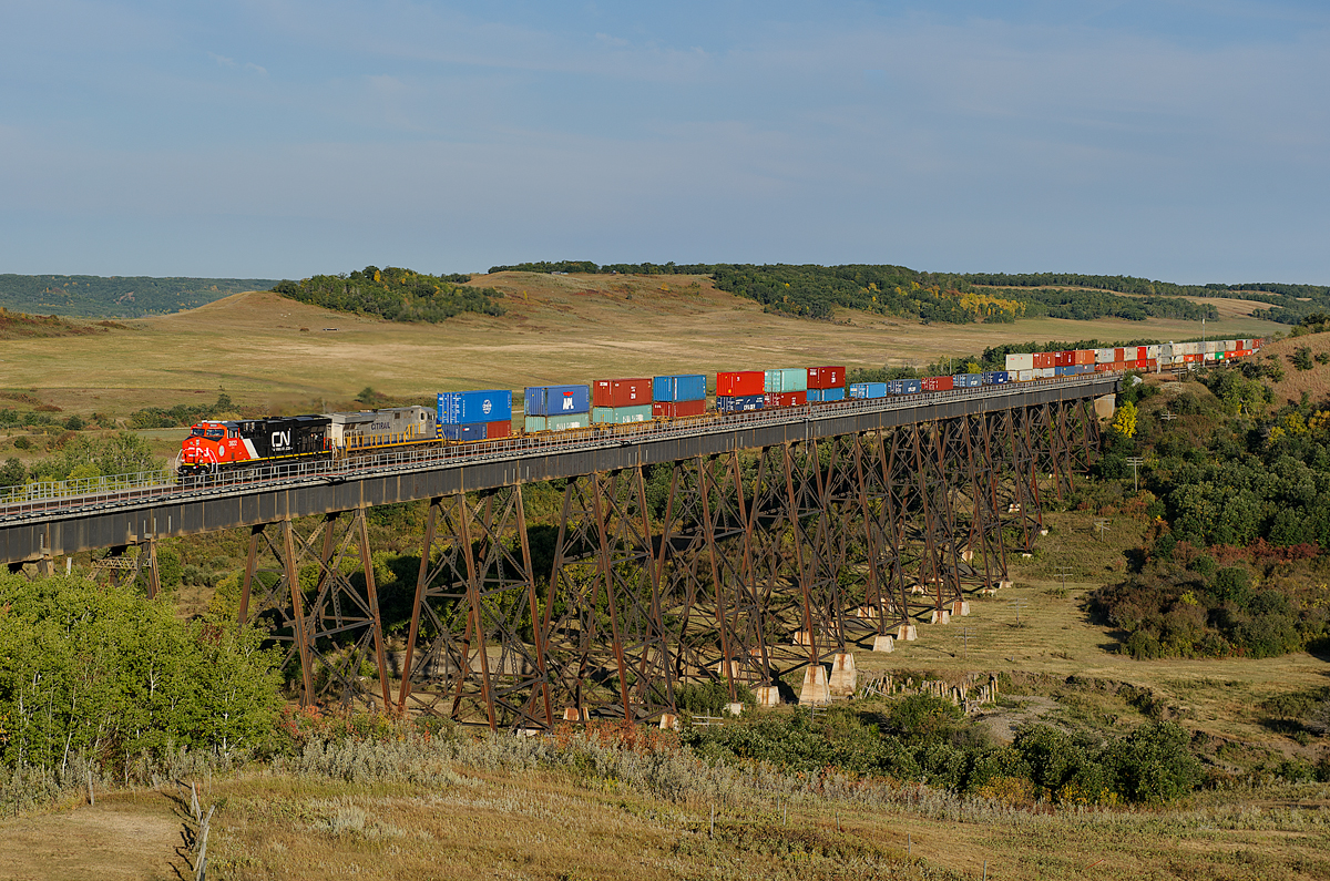 Brand new CN ES44AC 3822 and CREX ES44AC 1506 lead CN train Q108 over the Uno, MB trestle in the beautiful Assiniboine Valley.