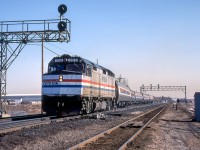 Amtrak 352 is heading through Burlington, Ontario on March 26, 1984.
