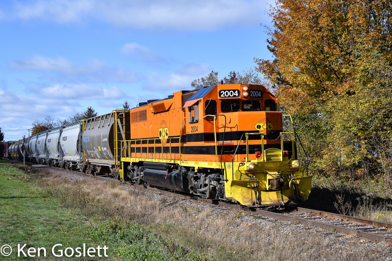 Quebec Gatineau's tri-weekly train eastbound at Lachute on a sunny October morning.