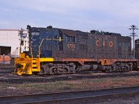 A rather tattered looking C&O 5732 at the roundhouse area in St. Thomas.  Perhaps Mr. Mercer might have an explanation of the fresh yellow paint on the short hood.   I was "home" in Ontario for a family visit and spent sometime with my Grandmother in St.Thomas. Did a short time railfanning while there and got a few images of the C&O. My Grandfather was an Engineer for the Wabash in St Thomas and the street he lived on there were railroader neighbors that worked for the CN, Wabash, NYC and the PM (C&O). Oh what a joy that would be to chat with those folks now.  St Thomas was a great railroad town for many years, sadly the railroads are all gone now.