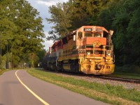 Running parallel down the Waterloo Spur Line Trail which was freshly paved by the region not too long ago, SL&A 3806 leads a handful of tank cars northbound on the Waterloo Spur towards Elmira on GEXR 584. Trailing unit was RLK 4095 and in this scene the train is approaching Roger st in Waterloo and not far from Uptown. <br> Time: 20:13