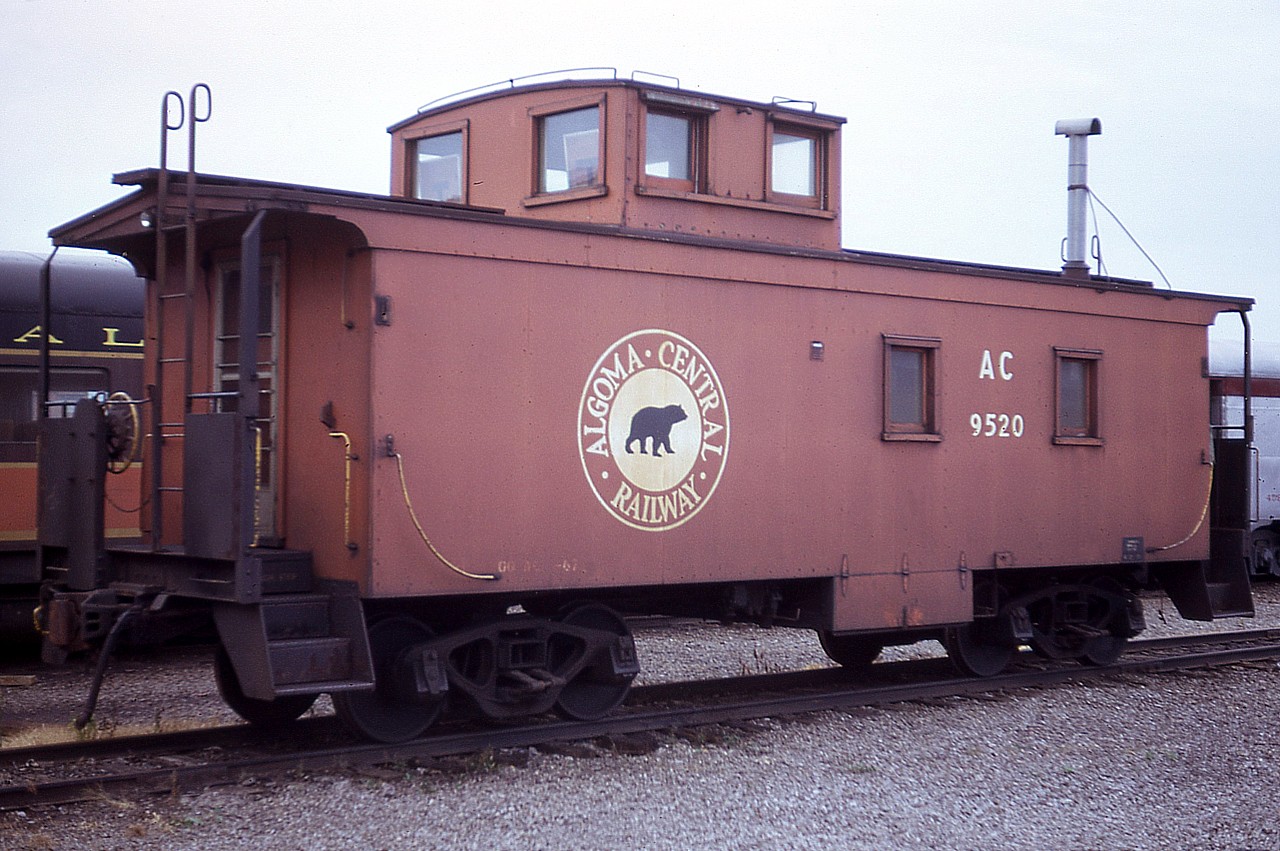 I do not have the information at hand, but I think this Algoma Central wooden caboose was one of about 6 or 7 on the roster in 1975 for the AC. It was built in 1948, probably one of the last of the wooden series. This image was taken in the Hawk Jct yard, 43 years ago now. Probably scrapped.  But you just never know with this kind of rolling stock, for AC 9520 went to Sault Ste Marie for use, on AC property,  as a Tourist Information Centre for the city, and from there I have no idea what happened to it.