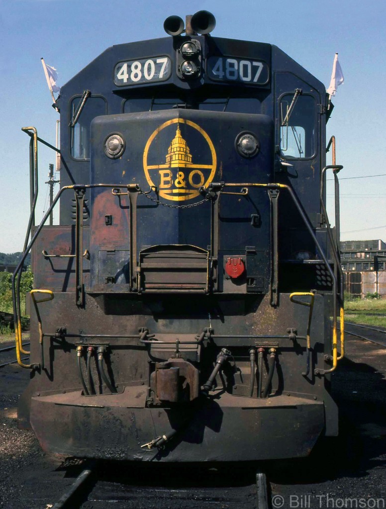 The front end of B&O GP38 4807, one of the many units power-shot CP had on lease in the 80's, sitting near the TH&B Chatham Street roundhouse in Hamilton. Some of these units were used on CP's steel train.