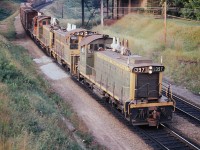 Green and gold was my favourite paint scheme for CN.  Three out of four of the SW1200RS units here are painted that way.  It is interesting to think that there is 4800 combined horsepower on the head end and today, a single AC4400 comes close to replacing these four locomotives.  