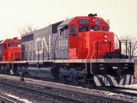 Maiden voyage? Maybe.  CN 5023 and 5027, elephant style, after being delivered in late December, are seen here switching at Aldershot East.  I photographed these units in London a few days before this picture was taken after they were delivered to CN from the General Motors Diesel Division plant.  