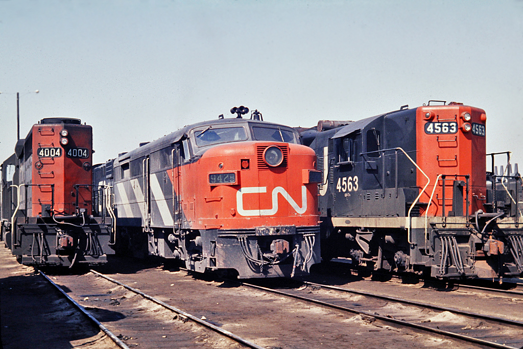 MLW FA2 9428 is close to retirement here in 1968.  The 4563 would survive much longer being rebuilt into a GP9RM in 1986 and renumbered 7227. CN 4004 was about a year old when this picture was taken and would be retired in Nov 1998.