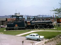 CN Pacific 5580 (a K3b built by the GTR in 1911) is shown on display at Riverside Park in Windsor back in May 1964, where it still resides on display today. In the background, one can see part of the old Wabash (later Norfolk Southern) rail ferry operation that operated between Windsor and Detroit until April of 1994, when the higher dimensional freight cars being ferried could now take the newly enlarged Detroit River Tunnel (remnants of the ferry docks remain as well).