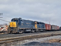 C&O 2527 is westbound at Hagersville, ON. on the CASO Sub.  The lead unit is a GE U25B and the trailing unit is a GP30.  The scar of where the tracks used to be is all that is left of this scene.  