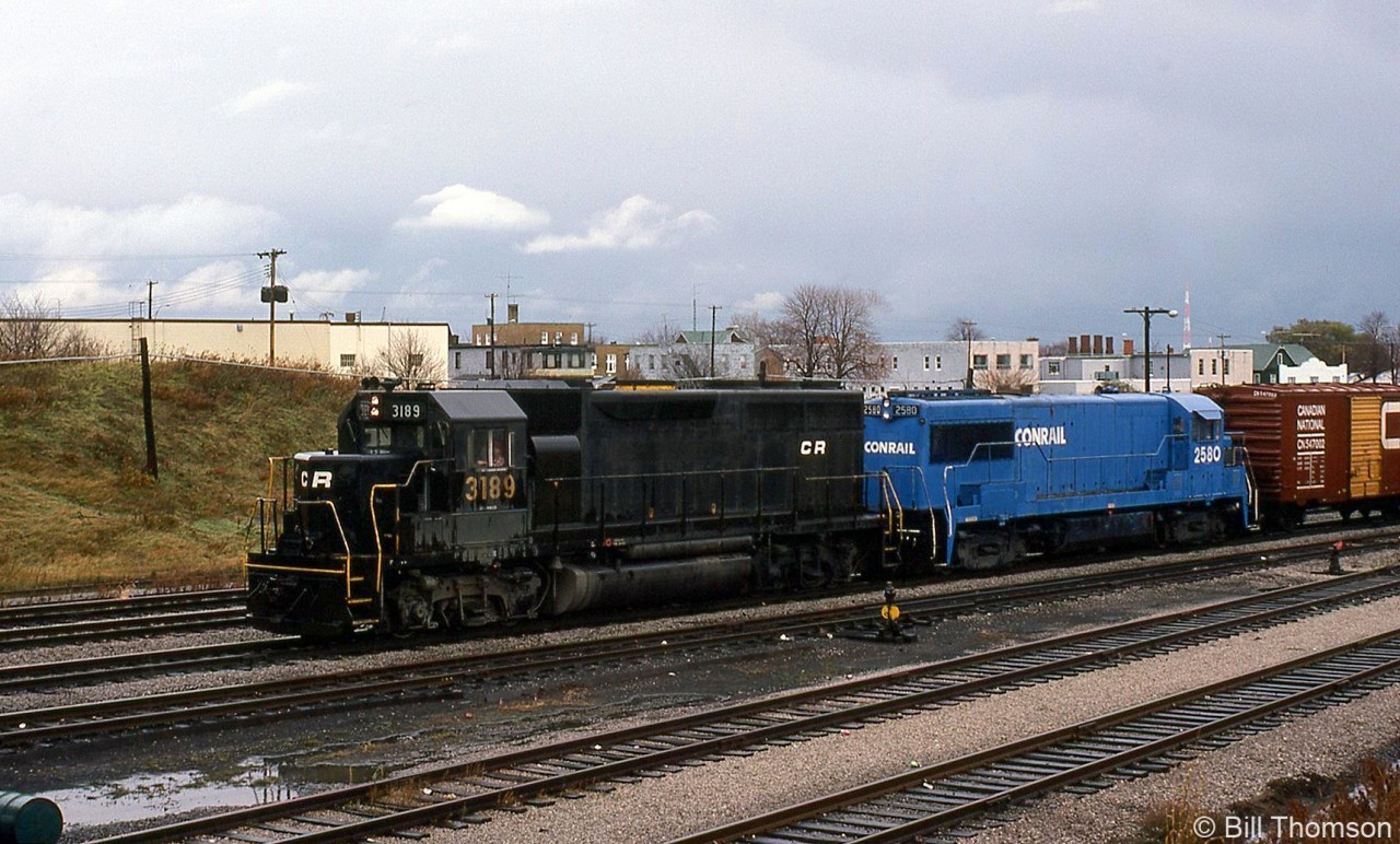 Another view of Conrail GP40 3189 leading its train from from Buffalo into Fort Erie after crossing the International Bridge into Canada. Trailing is U25B 2580 (ex-EL 2511), which was one of the earlier Conrail blue repaints done sometime between June and September 1976 (the first blue repaint was ex-PC GP40 3091 in May of 1976).