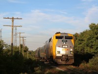 Long shadows, and late light accents old and newer technology as P42 907 passes the long unused and mainly forgotten telephone poles just east of Acton along Metrolinx’s Guelph Subdivision.