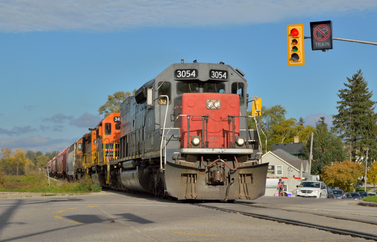 Blasting through Baden!  GEXR 431, with Canada's only SD45T-2, splits Baden's major intersection as it thunders home to Stratford doing every bit of 60mph.  The countdown is on for the November 16th takeover of the Guelph Sub as it returns to CN operations.
