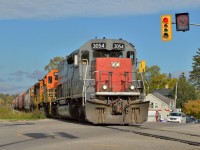 <b>Blasting through Baden!</b>  GEXR 431, with Canada's only SD45T-2, splits Baden's major intersection as it thunders home to Stratford doing every bit of 60mph.  The countdown is on for the November 16th takeover of the Guelph Sub as it returns to CN operations. 
