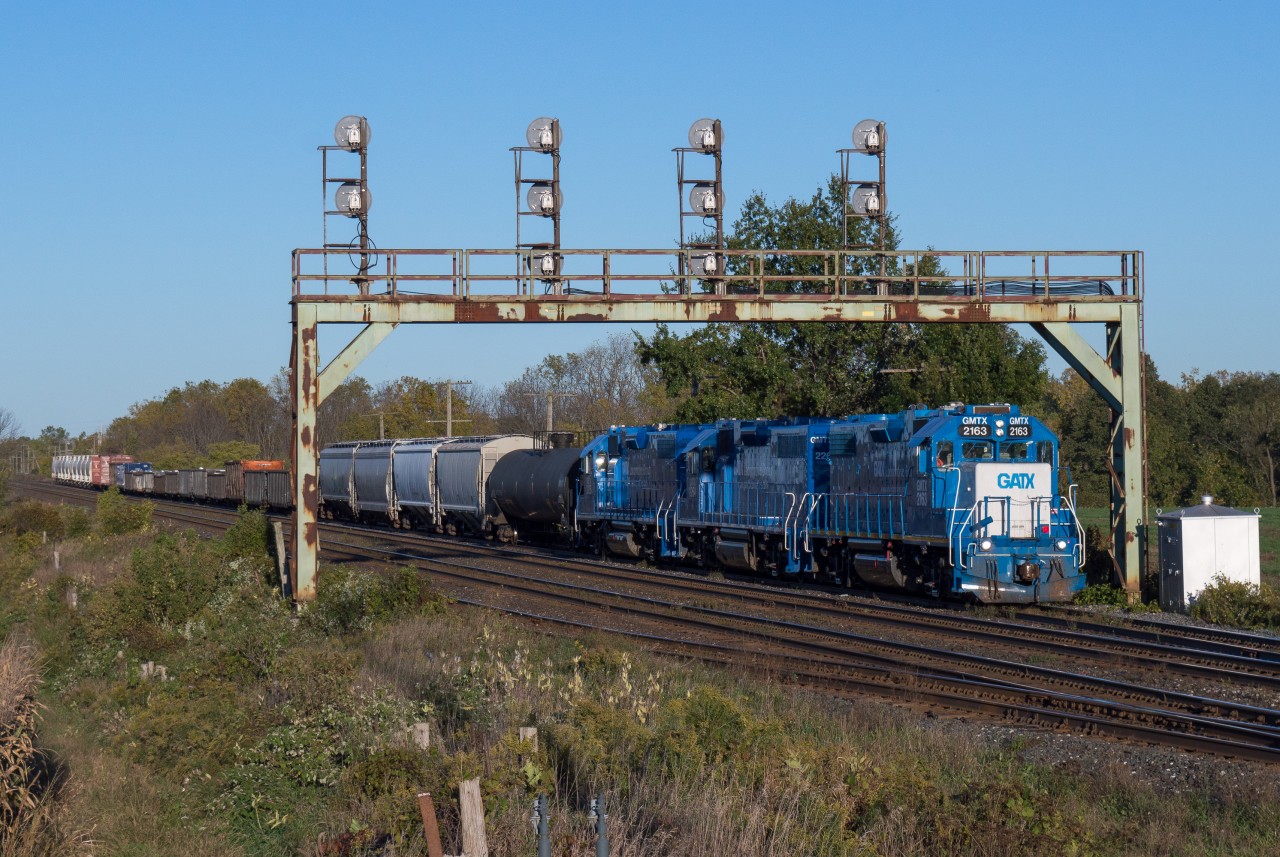 CN 582 is seen departing Paris West with a trio of GMTX lease units on a lovely fall evening.