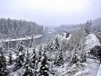 <br> 
<br> 
….Snowed Out September.......
<br> 
<br> 
...that SOS sure is pretty....
<br> 
<br> 
….at the new improved Morant's Lookout on the Bow Valley Parkway
<br> 
<br> 
  Downhill towards Banff, CP8879 East with a mixed freight aided by CP87x0 and dpu CP8733 mid train in the afternoon summer snow
<br> 
<br> 
  at a rather chilly 17:08 September 13, 2018 at CPR Mile 113 Laggan Subdivision, image by S Danko
<br> 
<br> 
what's interesting
<br> 
<br> 
..Google recognizes the search: Morant's Curve
<br> 
<br> 
  the National Park Historic Plaque celebrating Nicolas Morant is across the BVP on the north side
<br> 
<br>
  reportedly the CPR and the National Park management were concerned that someone would fall, drive off, or otherwise slide down the BVP embankment – hence the heavily engineered improvements including walkway, railing, a cross walk and relocated parking area is on the north side BVP
<br> 
<br>
...all is needed now is a Chip Truck !
<br>
<br>  
sdfourty...